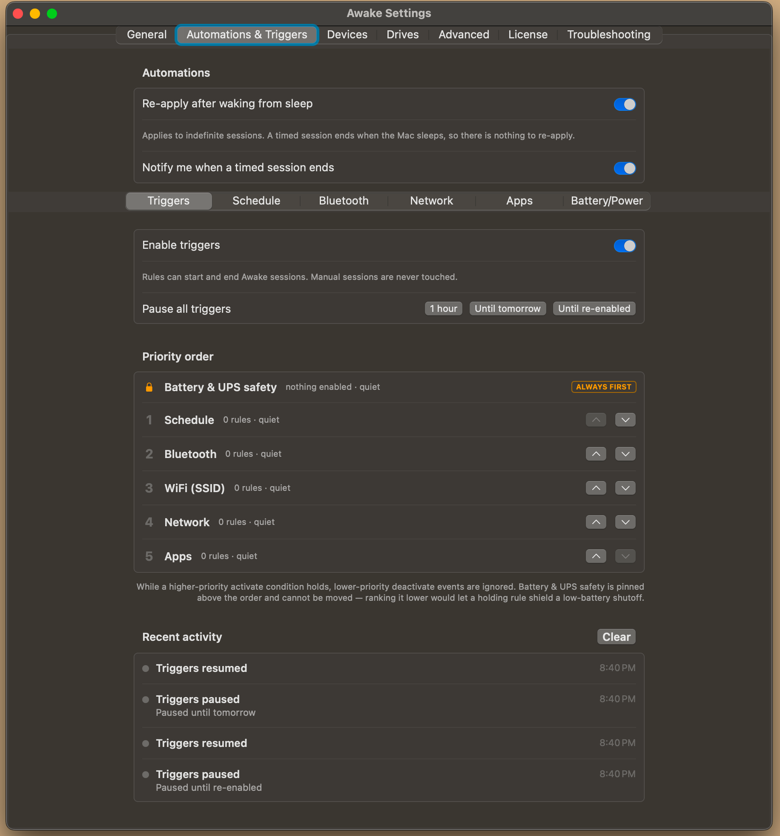 Awake Settings, Automations and Triggers: enable or pause all triggers, the pinned Battery and UPS safety row, the rule priority order, and recent activity